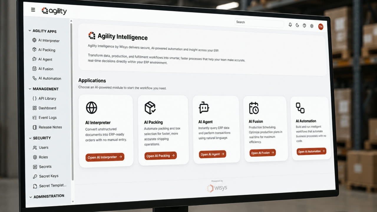 Agility Intelligence dashboard shown on a monitor in a warehouse